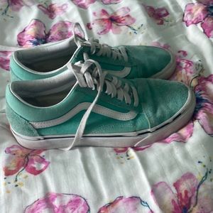 woman’s teal vans